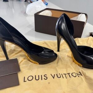 Louis Vuitton Elegant Black Heels with Gold Trim